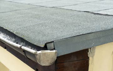 repair or replace The Riding flat roofing?
